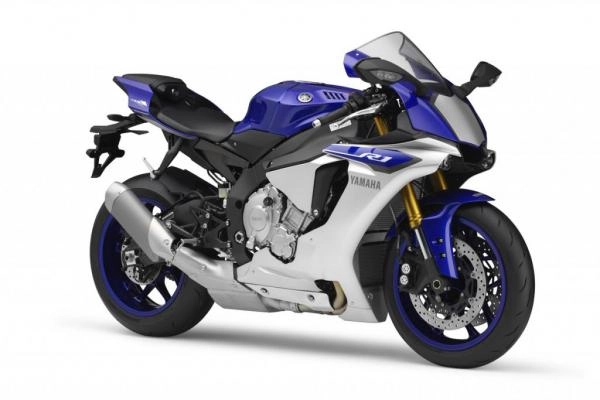 Moto sportive Yamaha YZF-R1 2015 bleue et argent sur circuit.